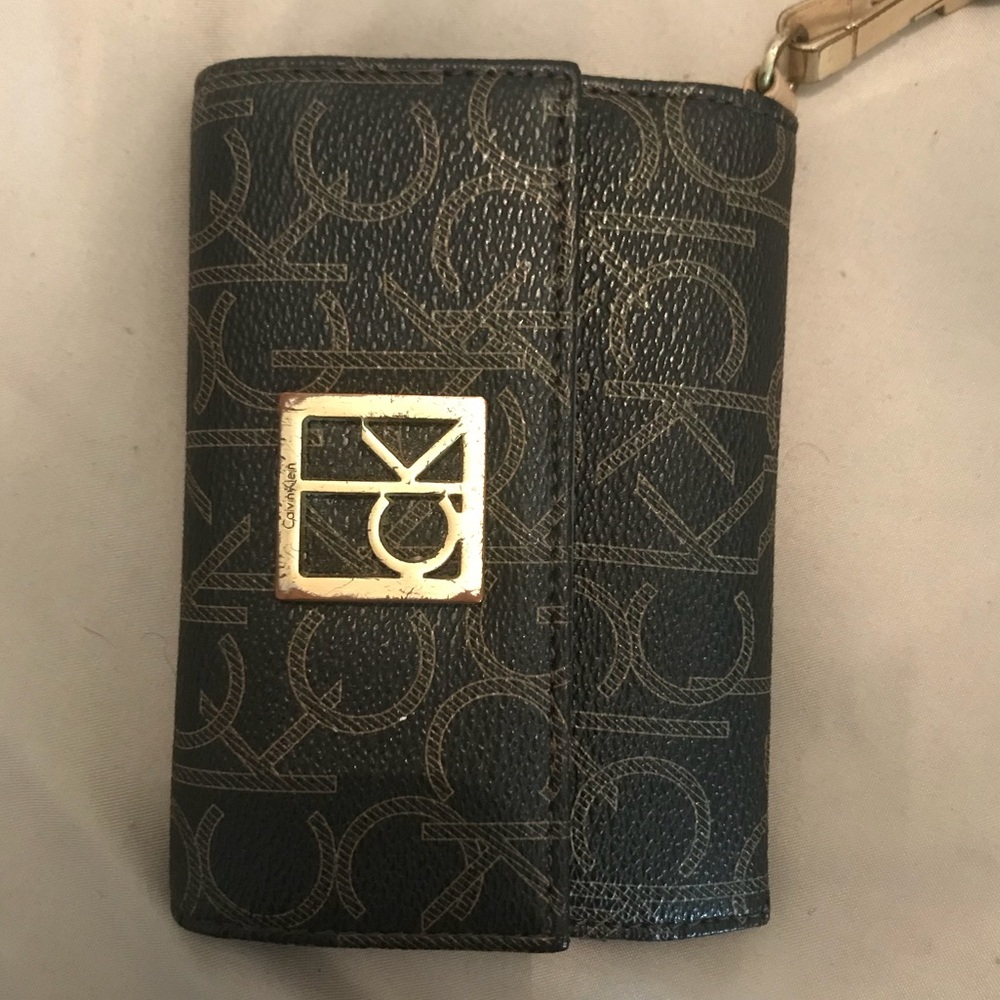 Authentic Calvin Klein wristlet w/ iphone5 holder